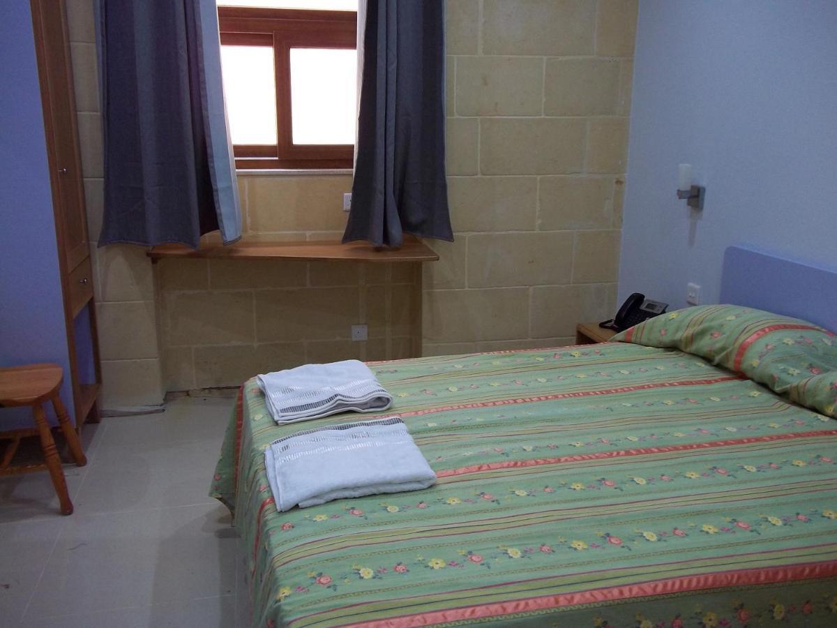 Country Inn Sannat Kültér fotó
