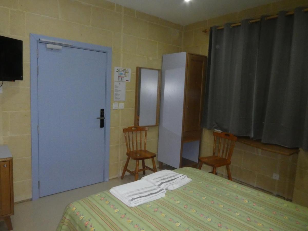 Country Inn Sannat Kültér fotó